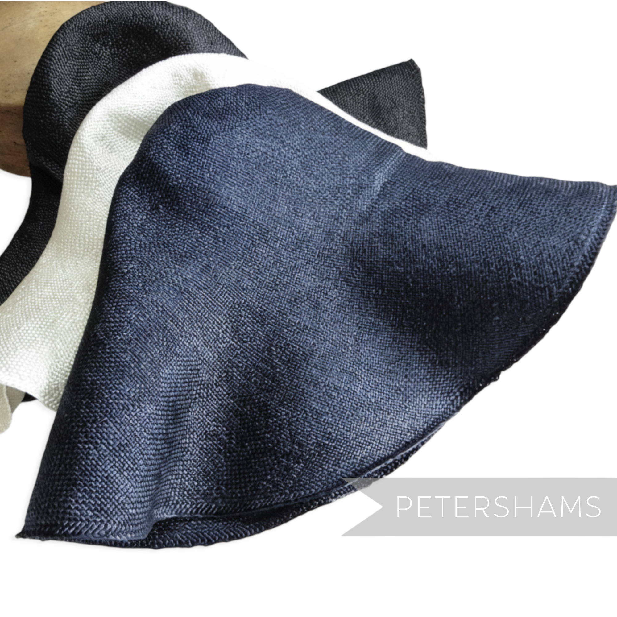 Petershams Millinery Supplies XL visca capeline hat bodies in black, white, and navy with a 1x1 checkerboard weave.