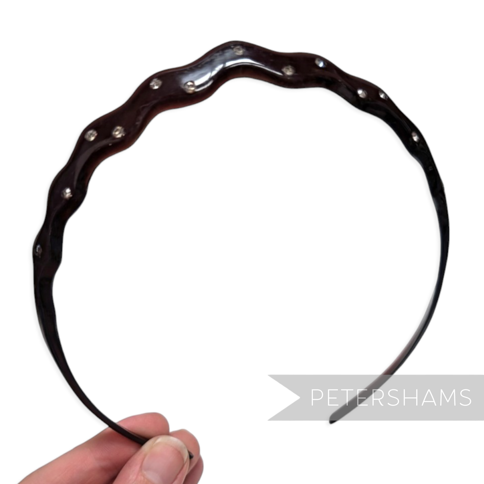 Petershams Millinery Supplies dark brown plastic headband with a wavy design and scattered clear diamantes.