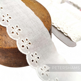 Petershams Millinery Supplies vintage white cotton broderie anglaise lace trim with floral cut-outs and scalloped edge