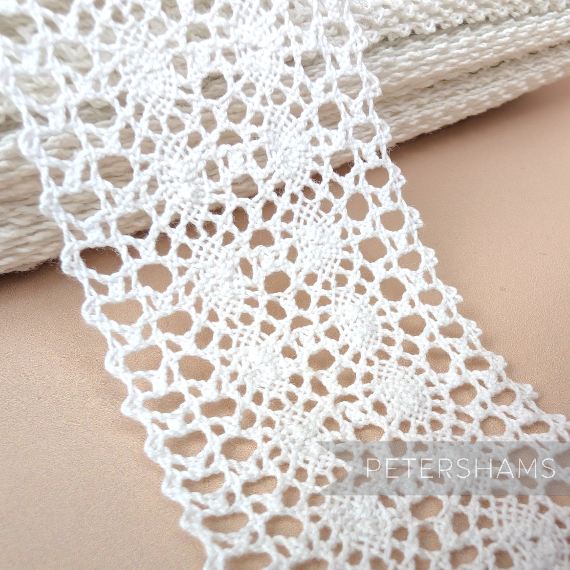Petershams Millinery Supplies 43mm wide white cotton lace trim with an intricate double-row picot edge pattern. Perfect for weddings, brides and veils