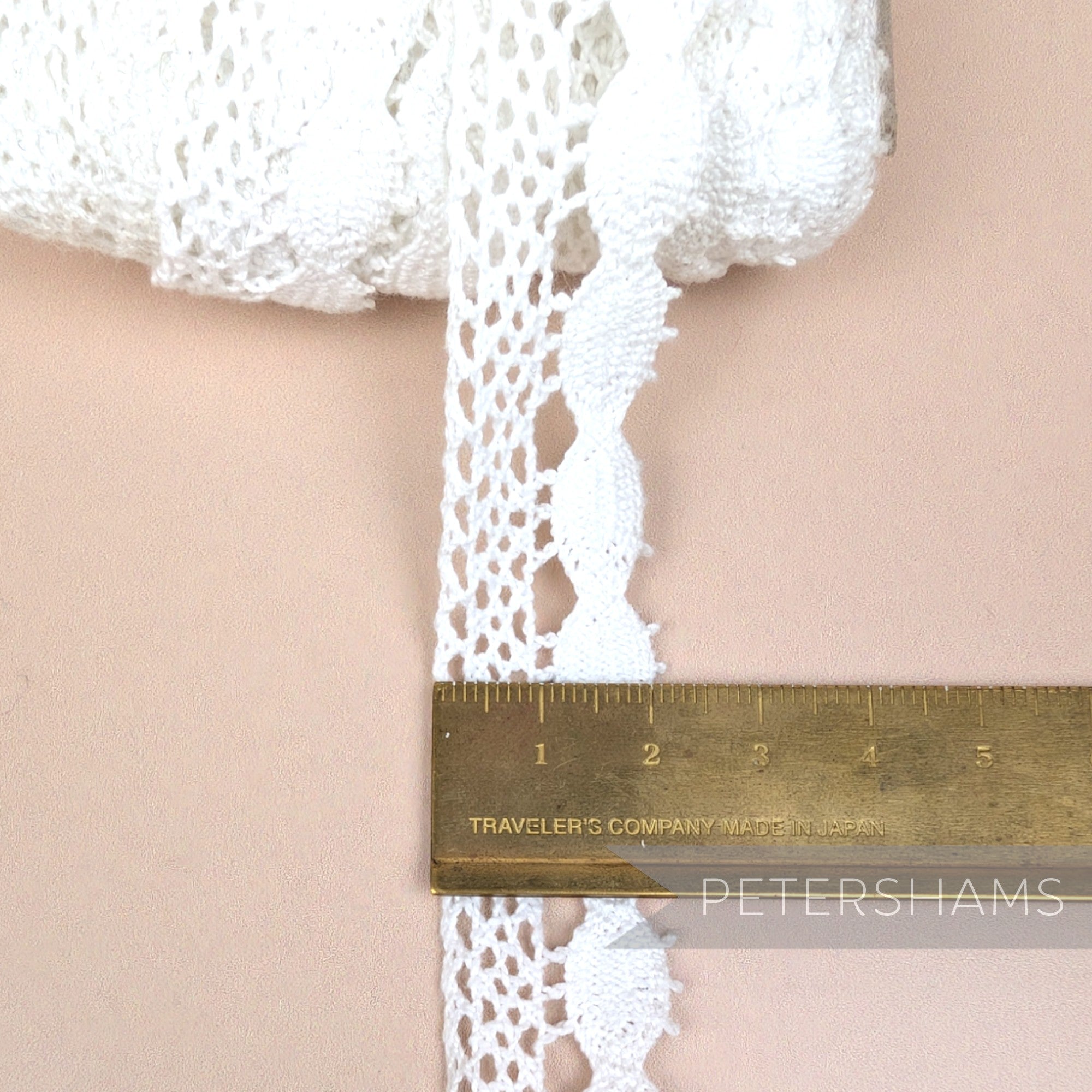 Petershams Millinery Supplies 22mm white cotton eyelash lace trim with intricate pattern
