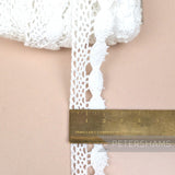 Petershams Millinery Supplies 22mm white cotton eyelash lace trim with intricate pattern