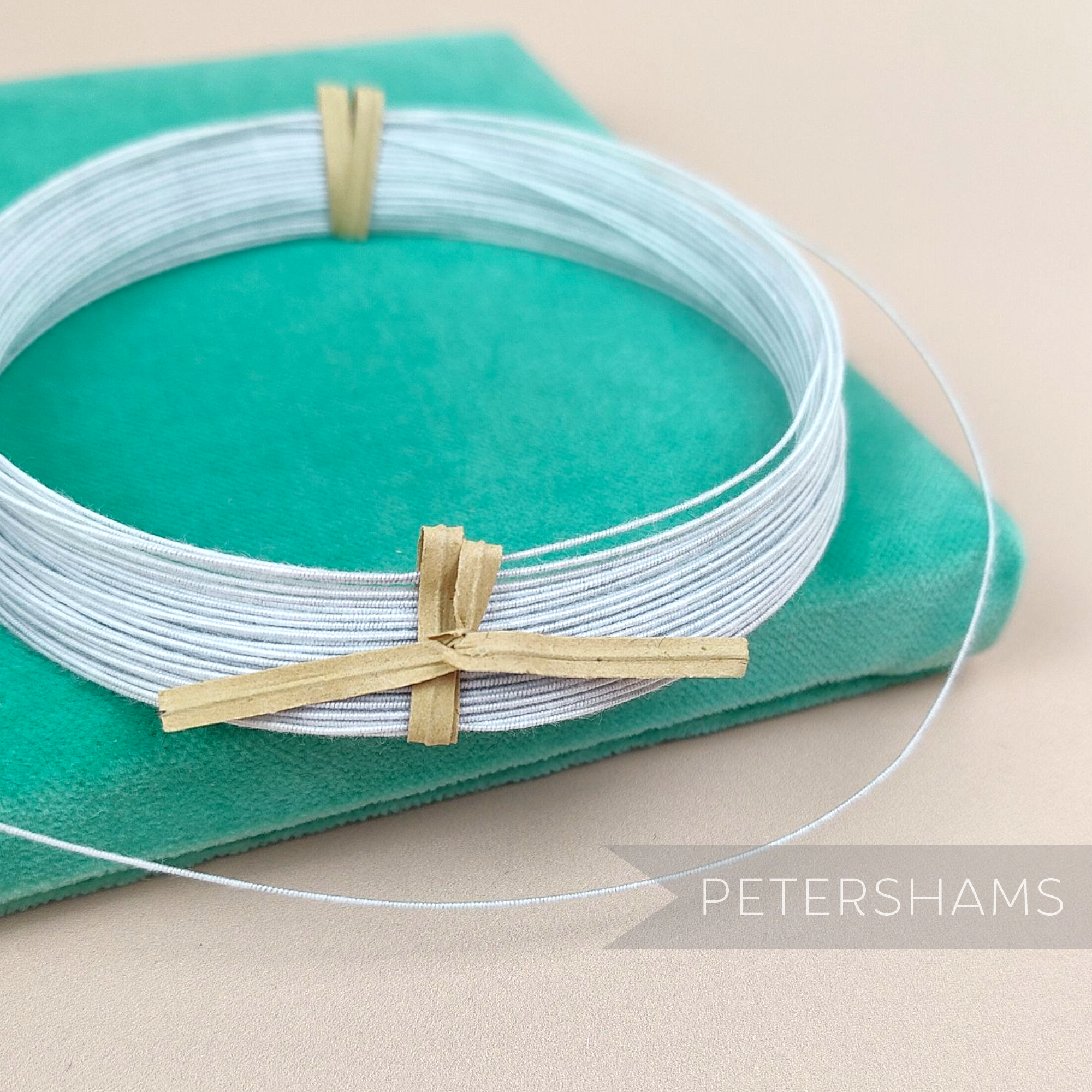 Petershams Millinery Supplies 0.4mm white cotton covered steel millinery wire for flower making and craft projects.