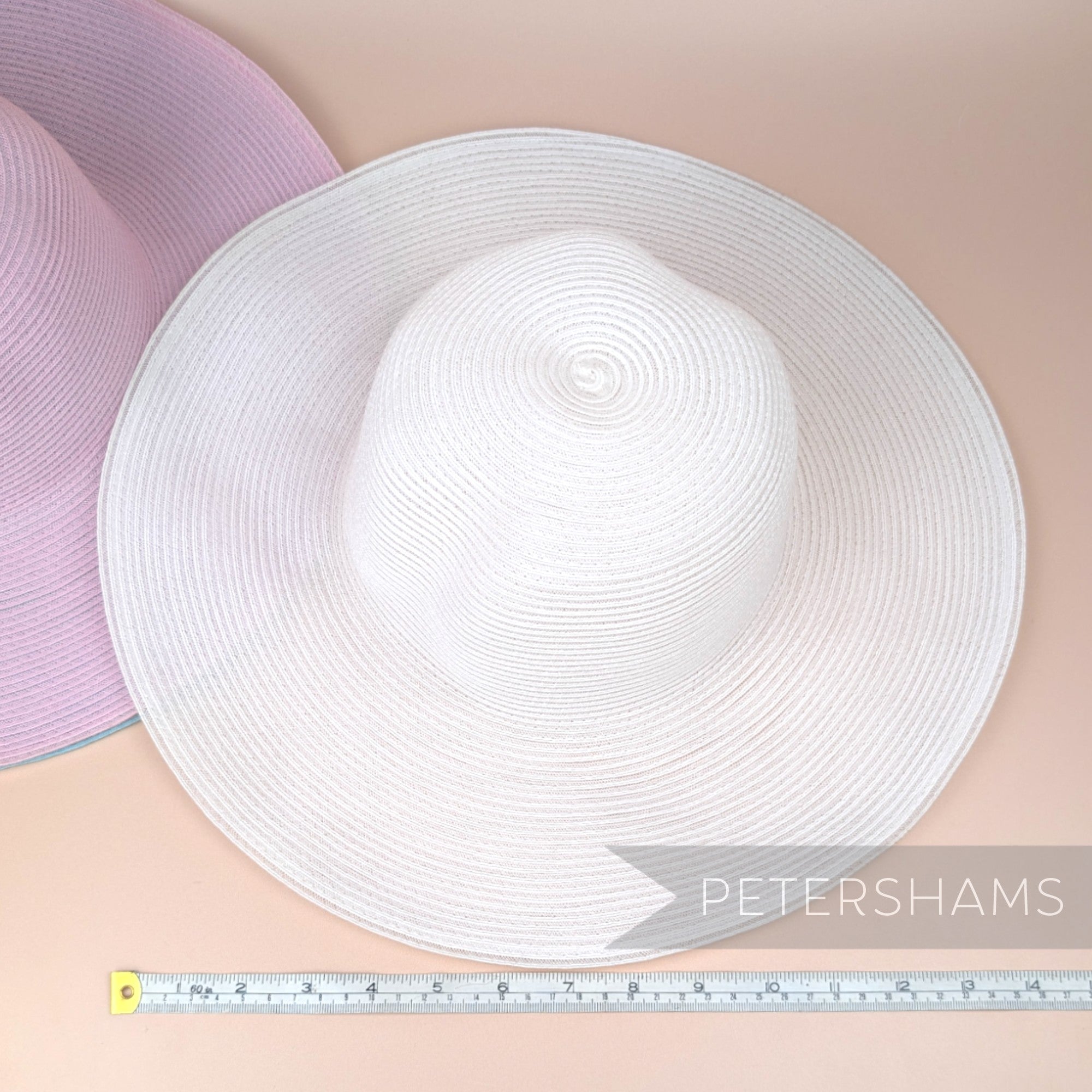 Petershams Millinery Supplies vintage white 1980s crinoline capeline hat body with a wide brim for millinery projects.