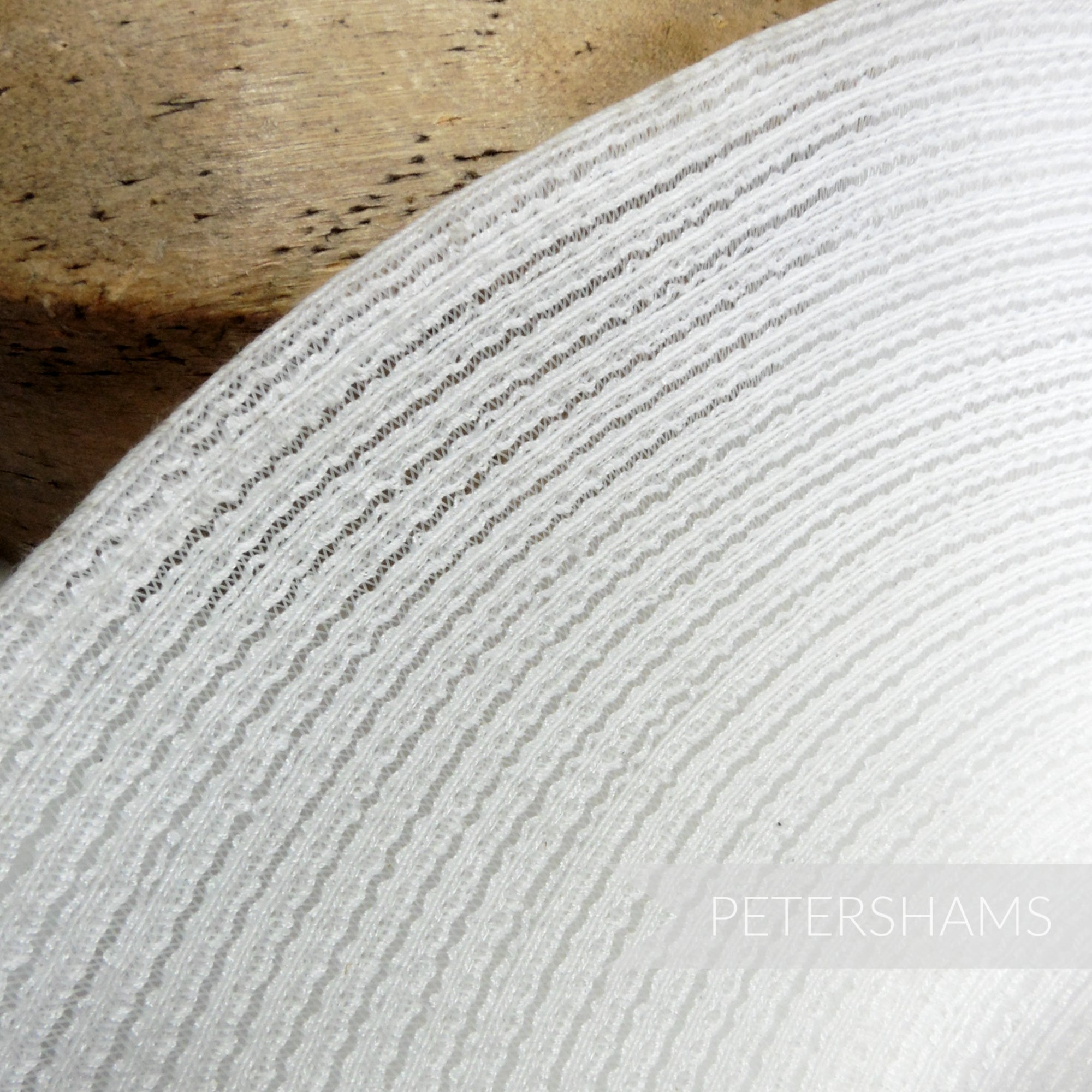 Petershams Millinery Supplies white threaded crinoline XL capeline hat body with swirled woven texture