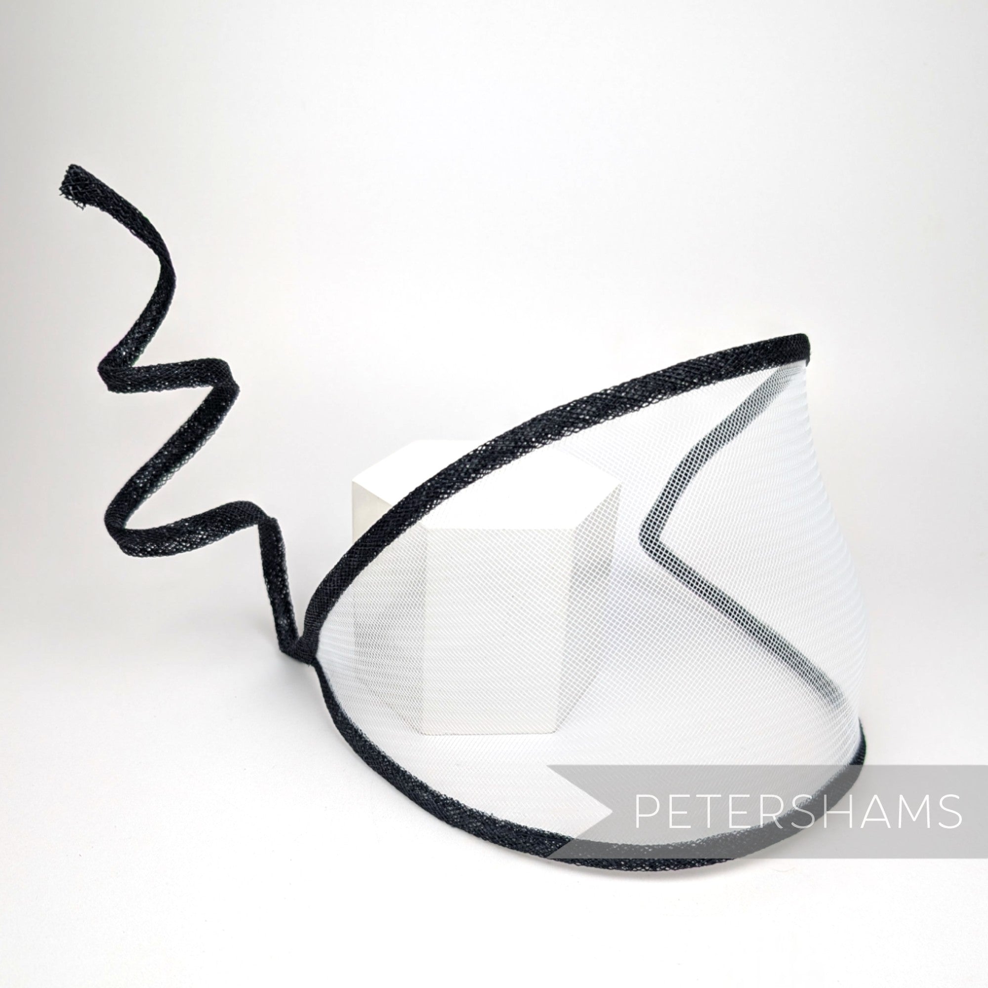 Petershams Millinery Supplies Astra white crinoline visor fascinator with a long, swirled black wired sinamay trim.