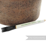Petershams Millinery Supplies white dressmaker fabric marking pencil with a black brush tip for sewing projects