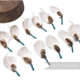 Petershams Millinery Supplies small white feather hat mounts featuring layered pheasant, hackle, and goose feathers.