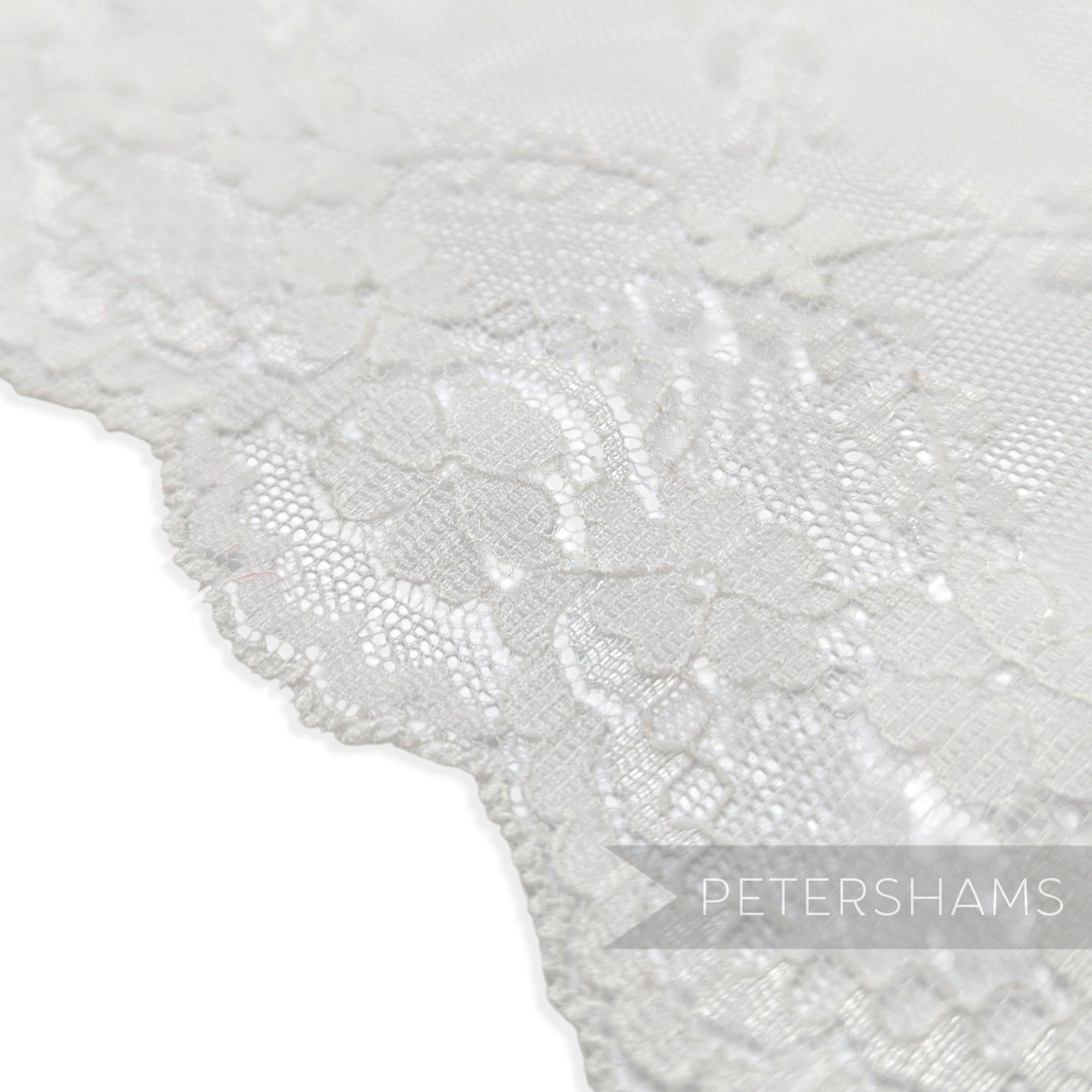 Petershams Millinery Supplies white sheer lace trim with floral scale pattern and scalloped edge for bridal veils