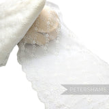 Petershams Millinery Supplies white sheer lace trim with floral scale pattern and scalloped edge for bridal veils