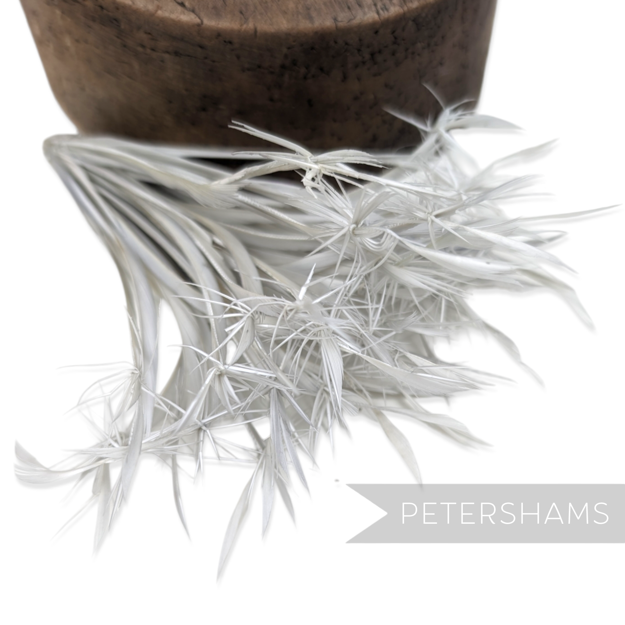 Petershams Millinery Supplies white goose biot feather mount styled in a firework effect for hat making