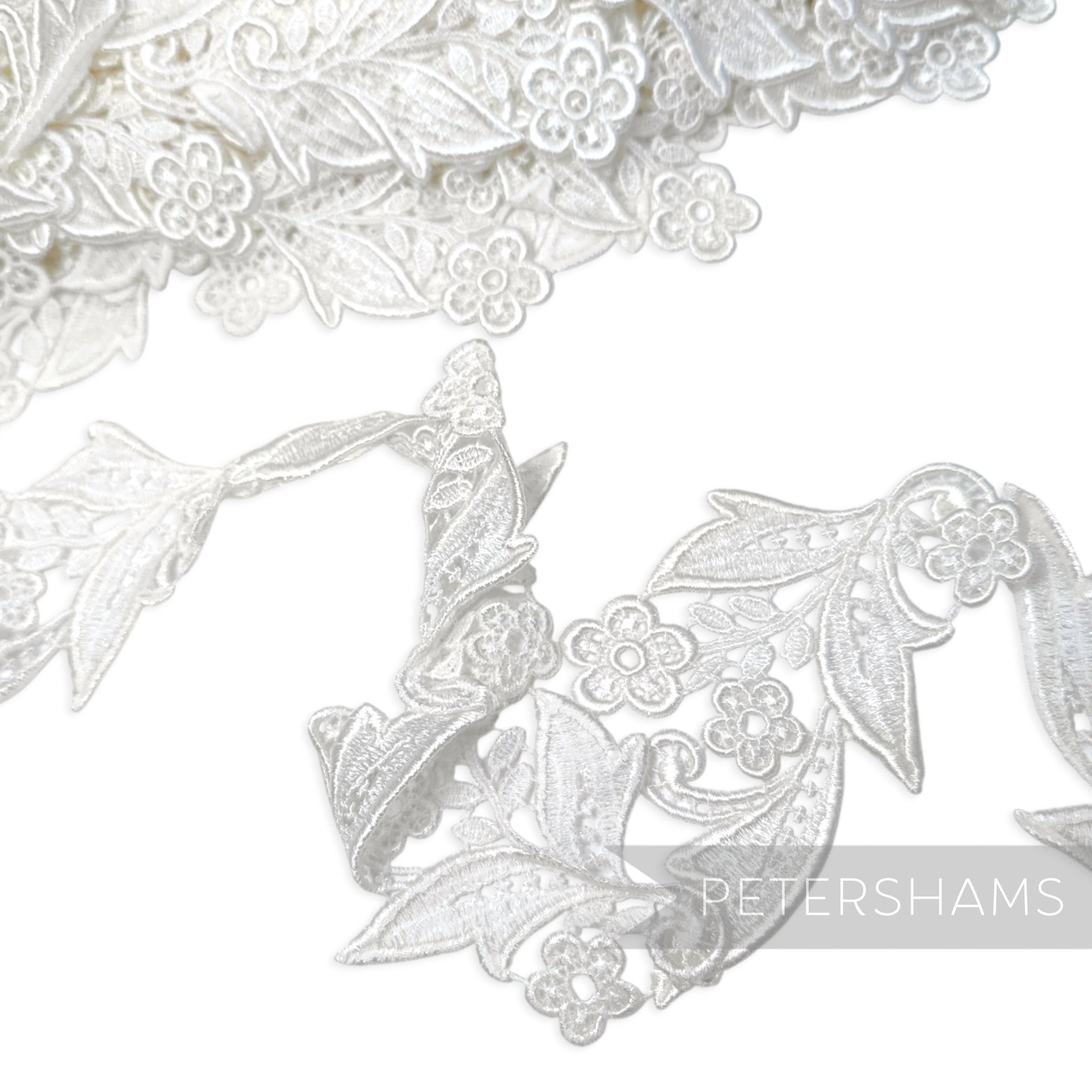 Petershams Millinery Supplies vintage white cotton guipure lace trim with swirling leaves and flower motifs