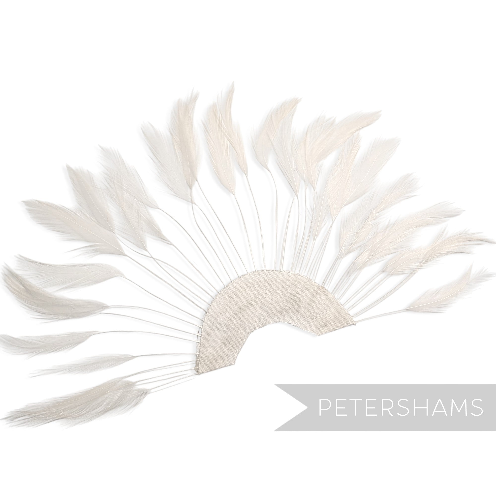 Petershams Millinery Supplies white stripped hackle feather fan on a cotton base for hat and fascinator trimming.