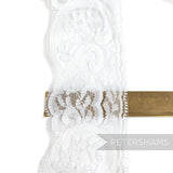 Petershams Millinery Supplies 6cm wide white vintage 1990s sheer lace trim with a swirly cloud and floral pattern.