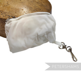Petershams Millinery Supplies white nylon fold-up bucket hat storage pouch with metal keychain clip