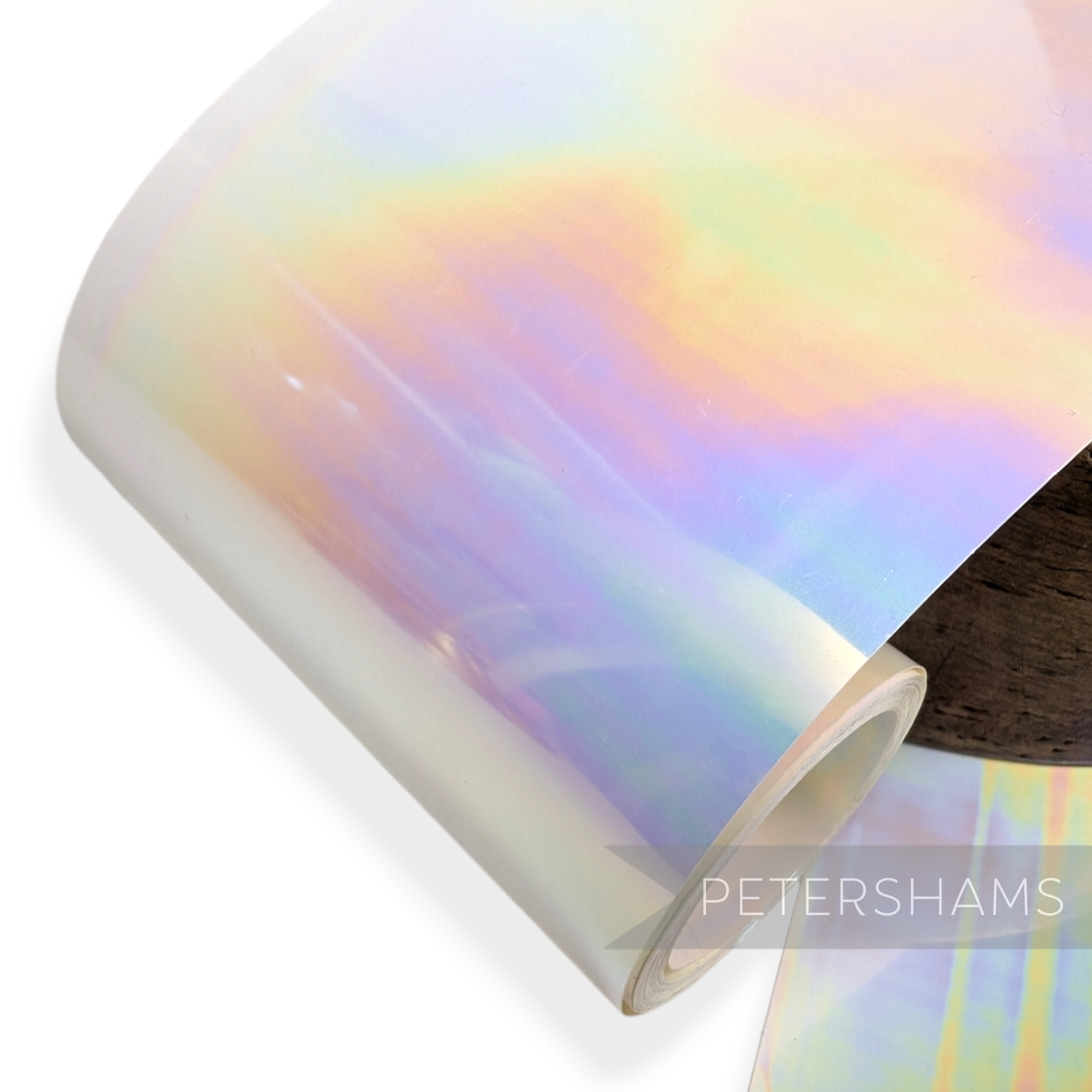 Petershams Millinery Supplies white opaque sequin film roll with a multi-colour iridescent oil slick finish