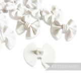 Petershams Millinery Supplies white plastic vintage bow buttons with back shank, 20mm.