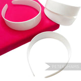 Petershams Millinery Supplies white plastic headband core blanks for DIY hair accessory crafting and decoration.