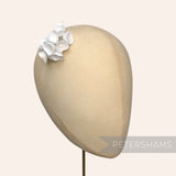 Petershams Millinery Supplies Claudia small white silk lily of the valley flower stems on a millinery head block