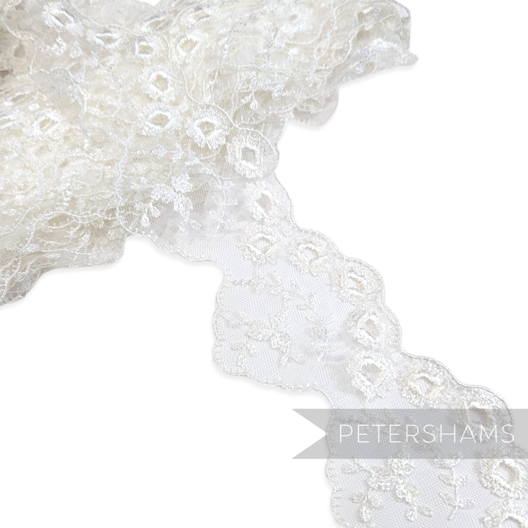 Petershams Millinery Supplies 80mm white tulle lace trim with eyelet, leaf spray, and scalloped edge design