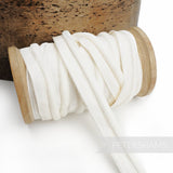 Petershams Millinery Supplies white 5mm velvet insertion piping cord wrapped on a wooden spool