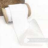 Petershams Millinery Supplies 50mm wide white French velvet ribbon on a wooden spool for millinery and craft projects