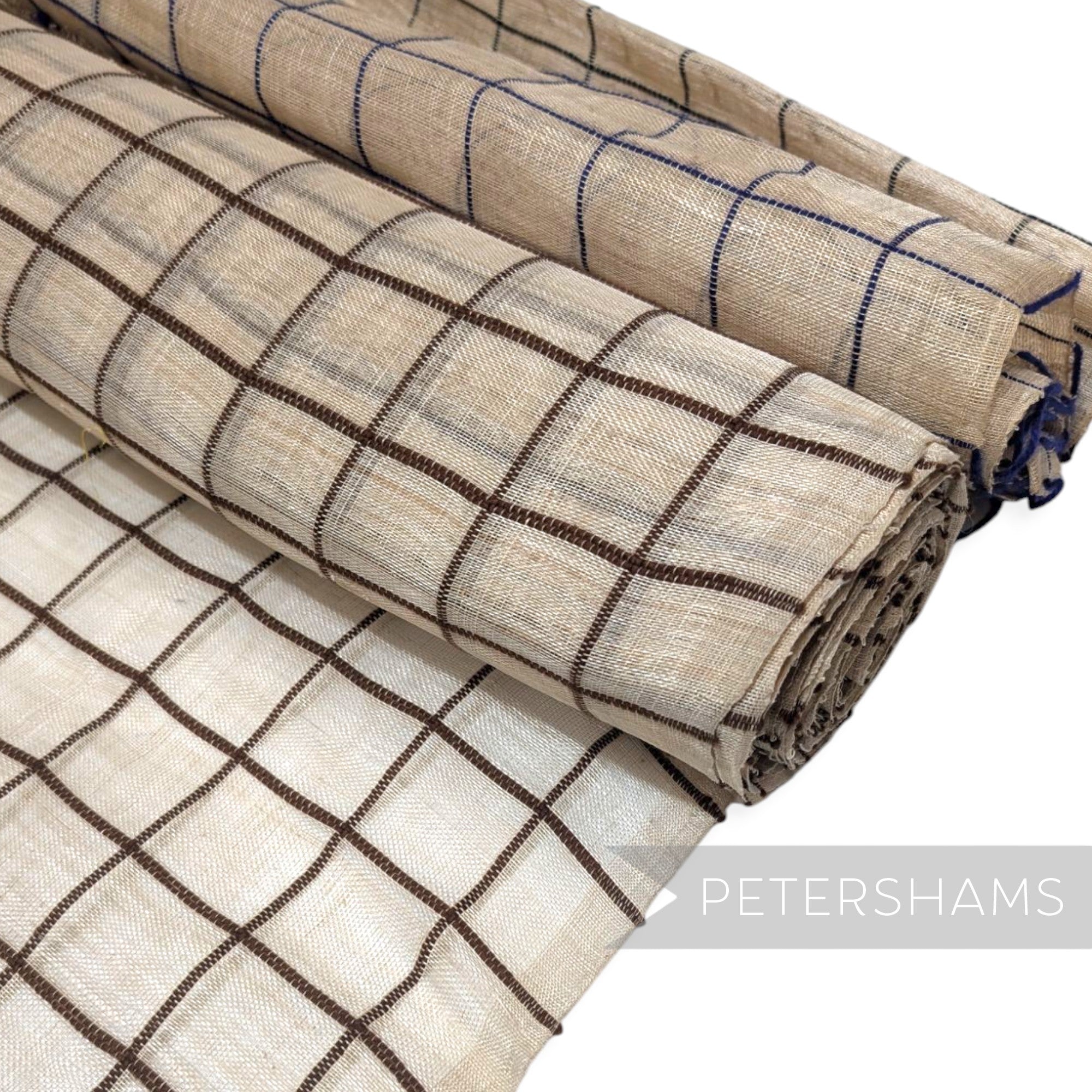 Petershams Millinery Supplies natural sinamay abaca fabric rolls featuring a woven wool yarn square check pattern.