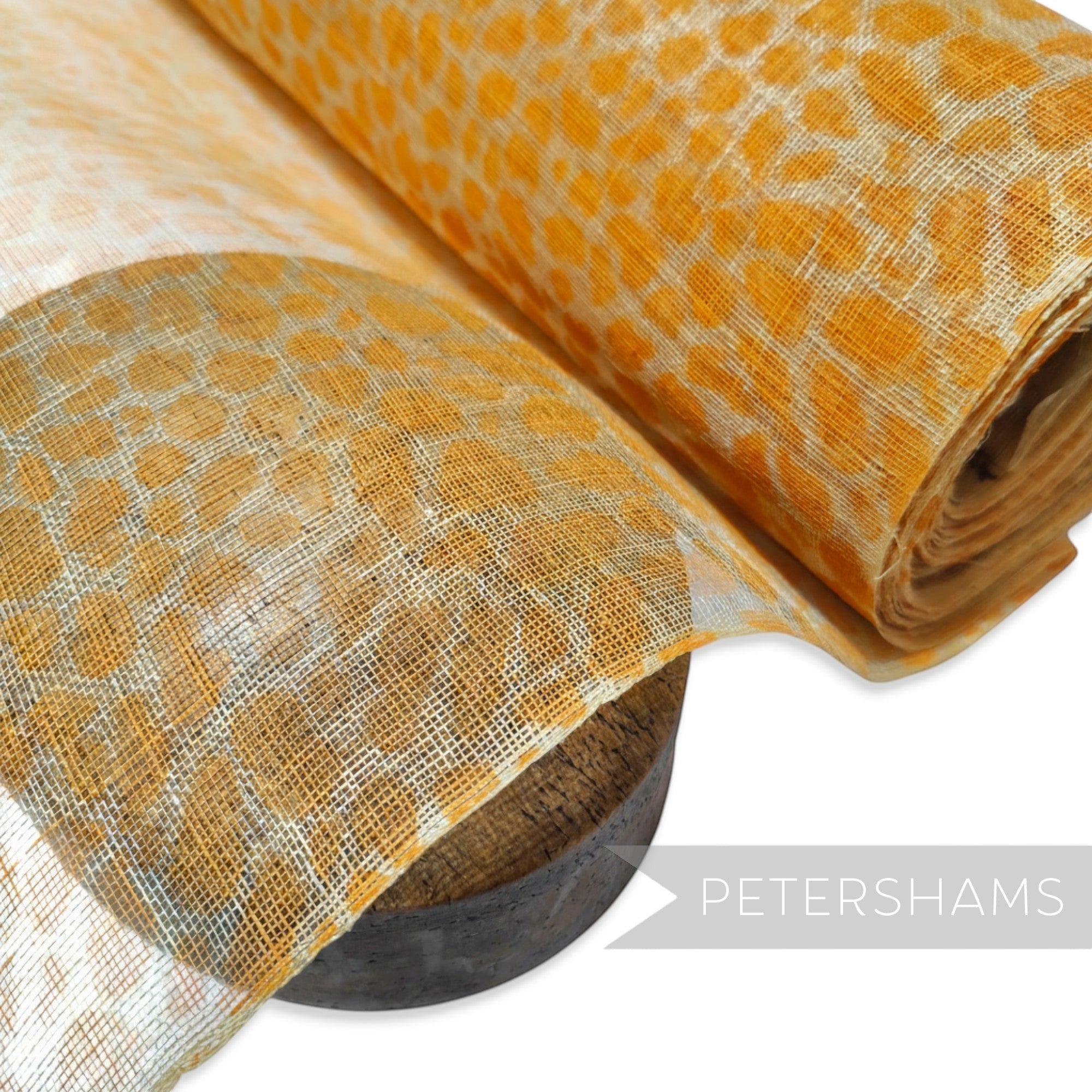 Petershams Millinery Supplies yellow cheetah print sinamay fabric, made from natural abaca, sold in 1/2m lengths.