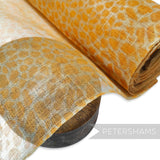 Petershams Millinery Supplies yellow cheetah print sinamay fabric, made from natural abaca, sold in 1/2m lengths.