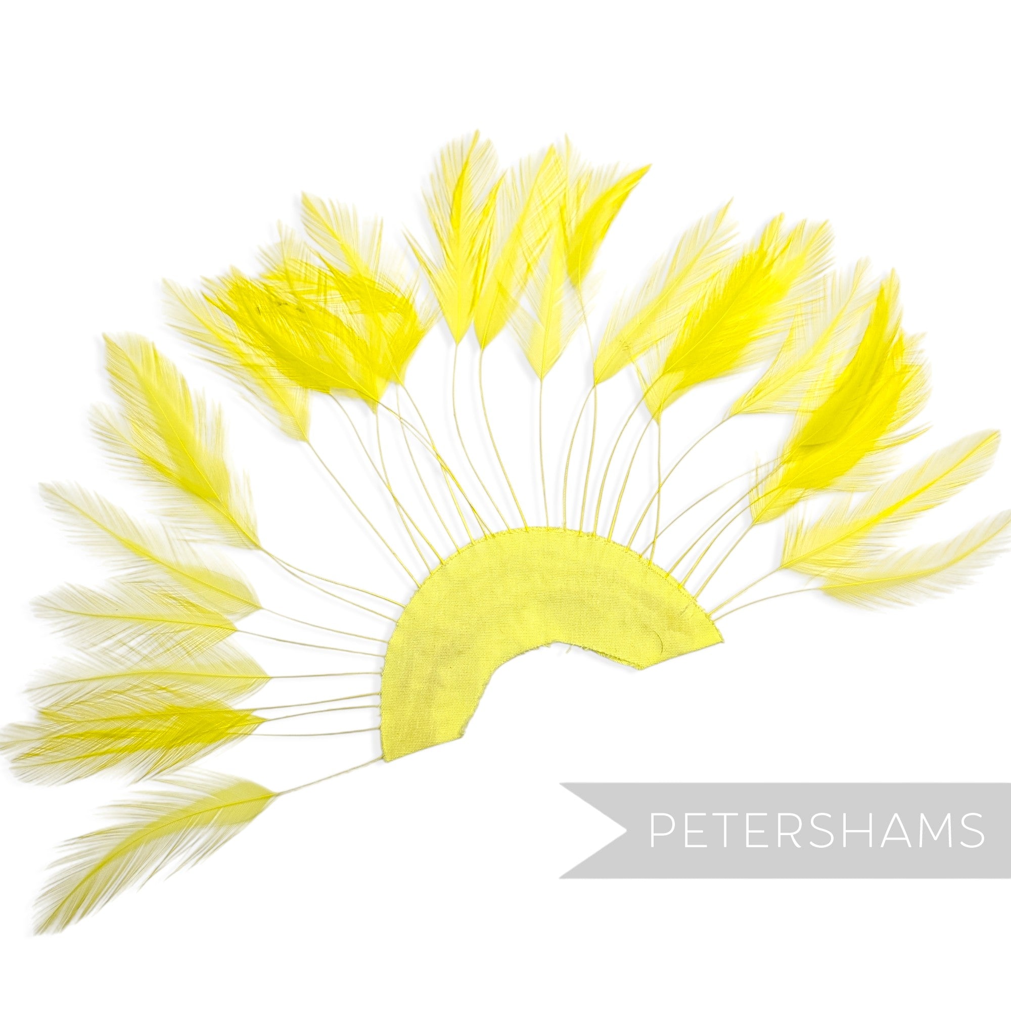 Petershams Millinery Supplies neon yellow stripped hackle feather fan on a cotton base for hat and fascinator trimming.