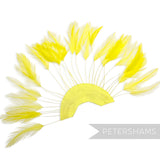 Petershams Millinery Supplies neon yellow stripped hackle feather fan on a cotton base for hat and fascinator trimming.
