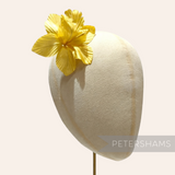 Petershams Millinery Supplies Coco yellow silk orchid flower hat mount on a millinery display head