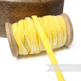 Petershams Millinery Supplies 7mm yellow vintage velvet ribbon on a wooden spool for millinery and craft projects