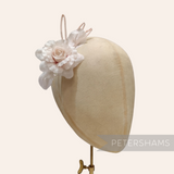 Petershams Millinery Supplies Zahra petite pale pink silk flower hat mount with wired leaves on a millinery head block.