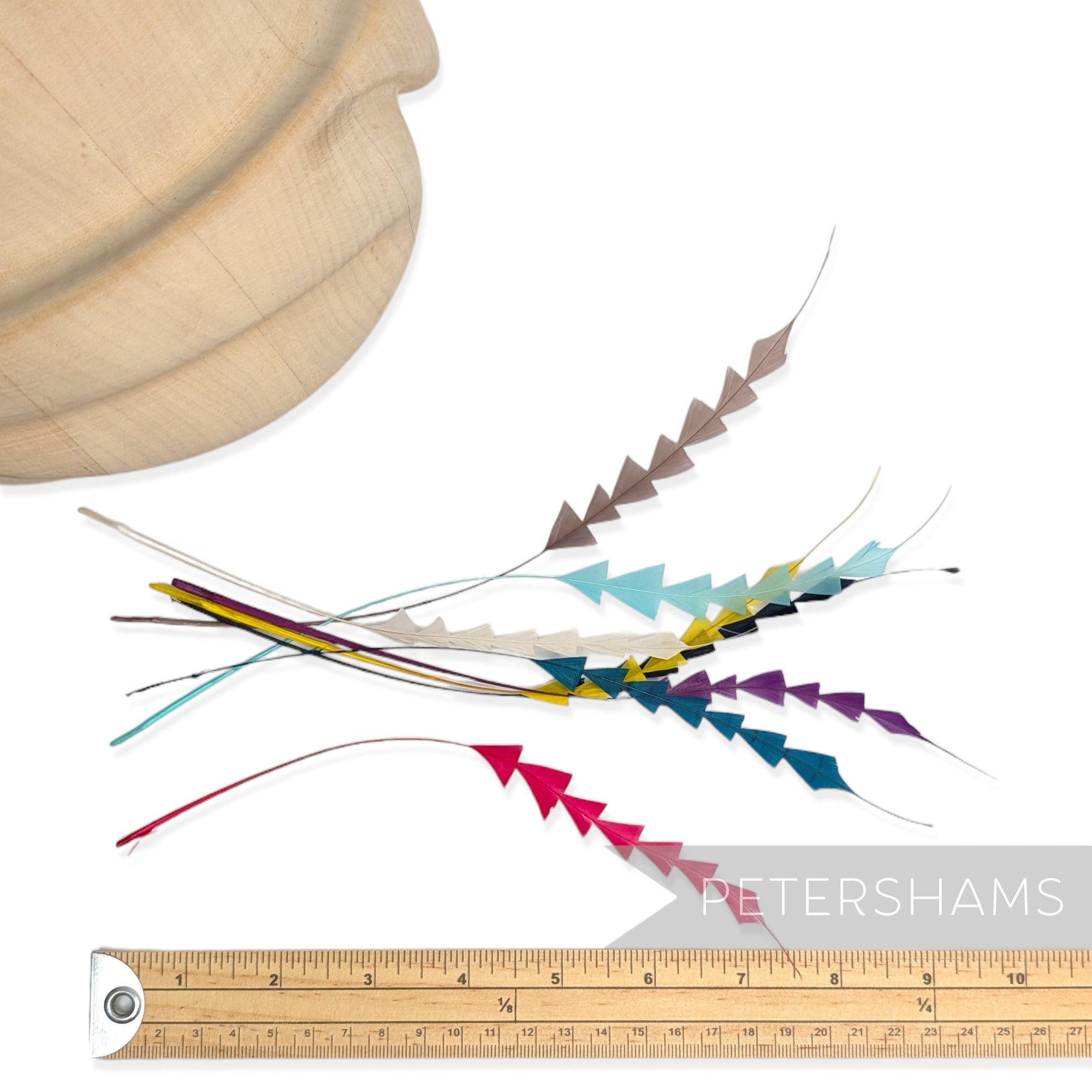 Petershams Millinery Supplies zig zag coque feathers in assorted vibrant colours for hat making and millinery crafts.