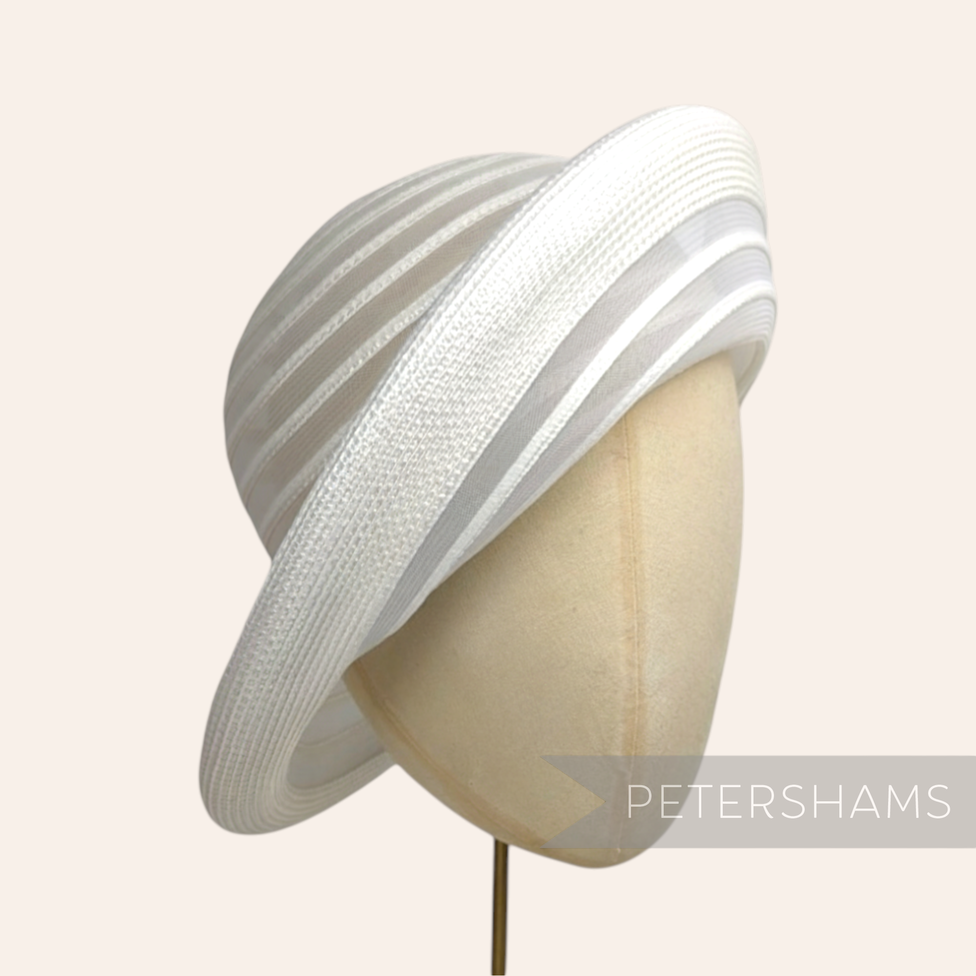Petershams Millinery Supplies white crinoline and poly-braid hat base with rolled edge brim and sheer striped crown.