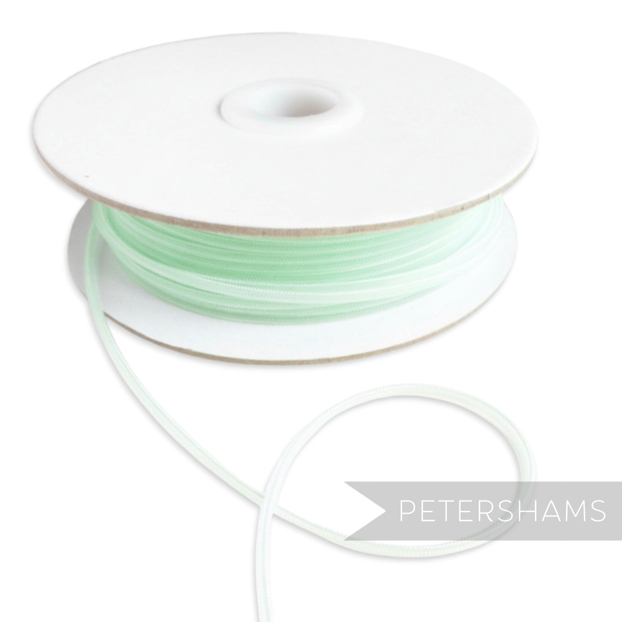 Petershams light mint green 2.5mm tubular millinery crin with central thread for gathering.