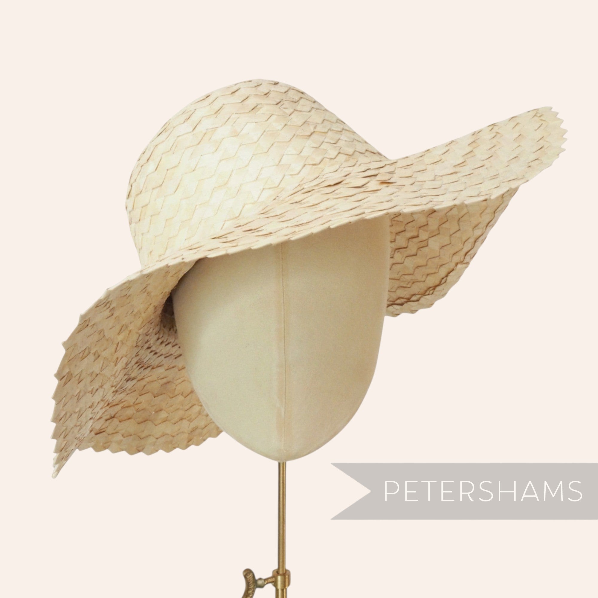 Petershams Millinery Supplies natural straw capeline hat body with zig-zag weave and wide brim.