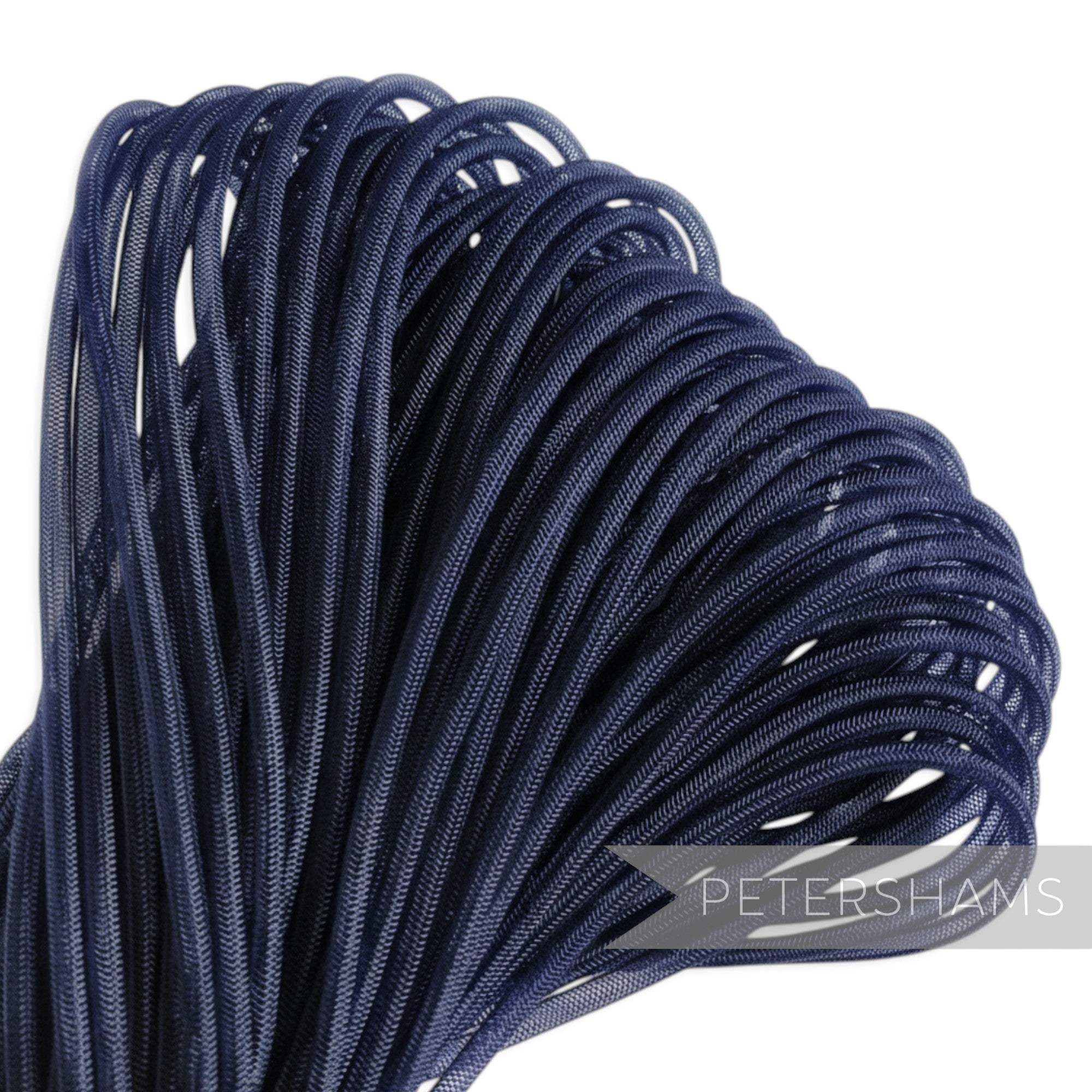 Petershams Millinery Supplies navy blue 4mm tube crinoline, a mesh-like trim for hat making and embellishments.