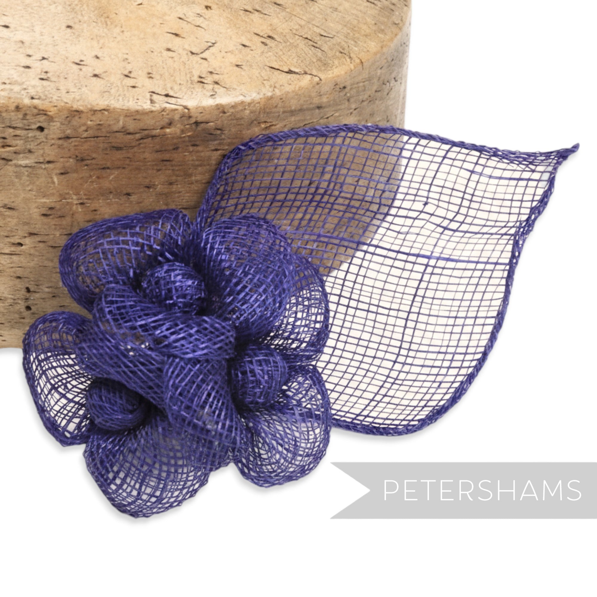 Petershams Millinery Supplies navy blue sinamay triple flower hat mount with leaf backing.