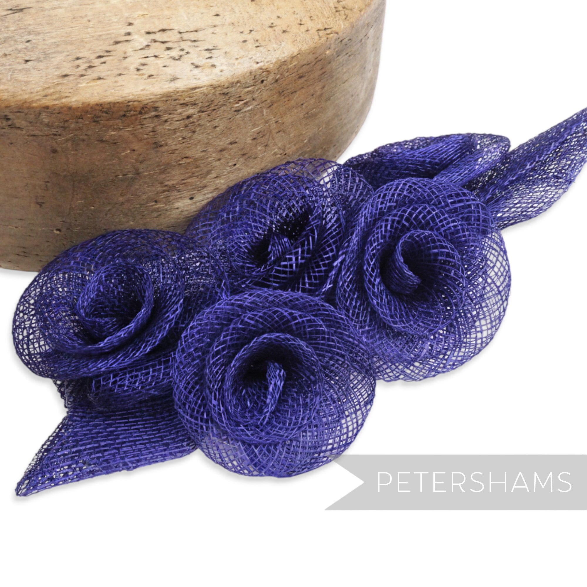 Petershams Millinery Supplies navy blue sinamay flower and leaf hat mount