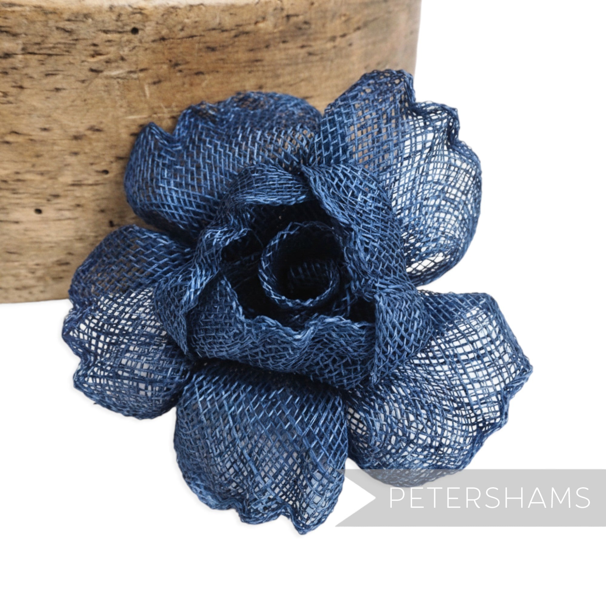 Petershams Millinery Supplies navy blue sinamay flower hat mount with crimped petals, 9-10cm width.