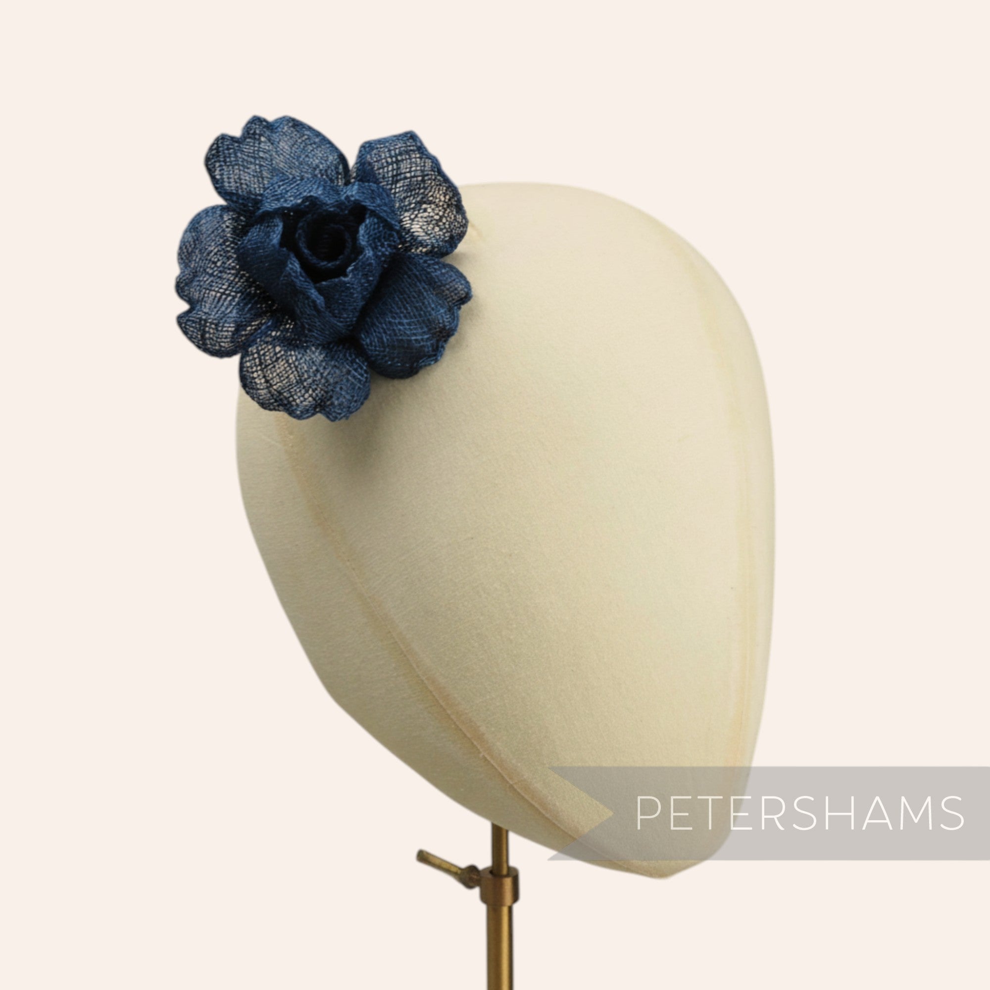 Petershams Millinery Supplies navy blue sinamay flower hat mount with crimped petals, 9-10cm width.