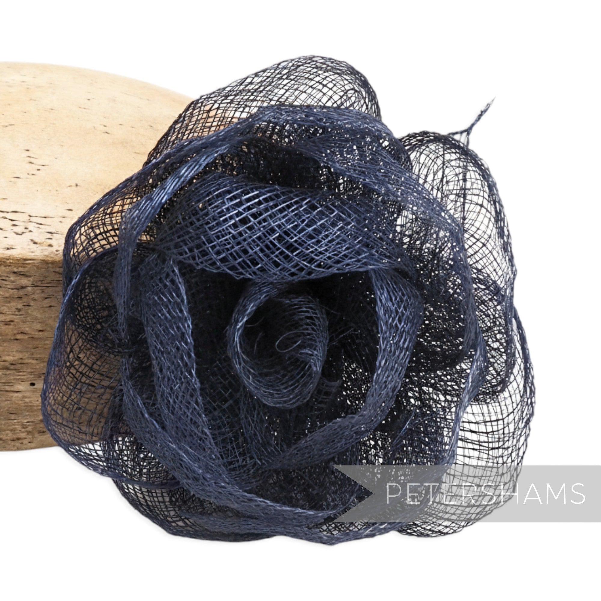 Petershams Millinery Supplies navy blue sinamay cabbage rose flower mount with wired leaf detail.