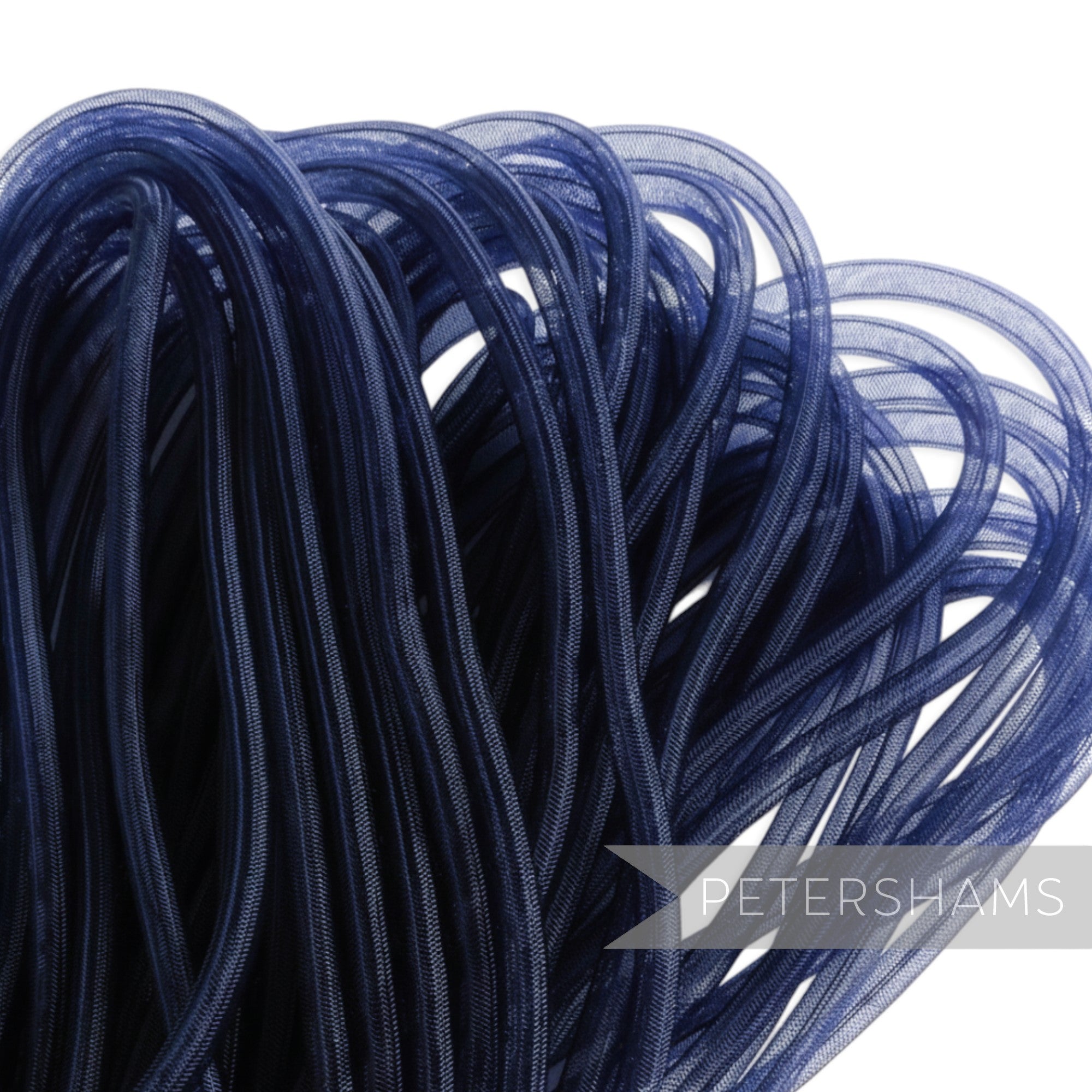 Petershams navy blue 8mm tube millinery crin, a mesh trim for hat making and embellishments.