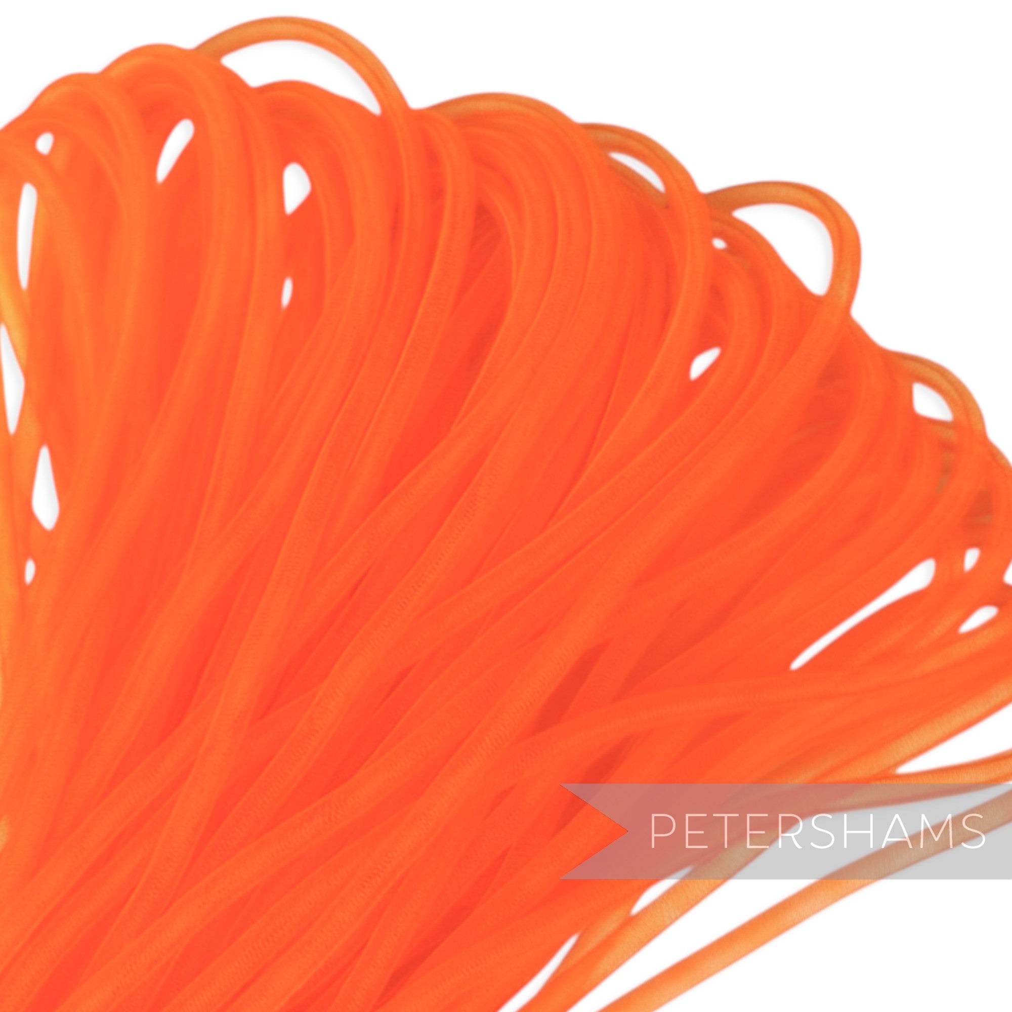 Petershams bright orange 6mm tube millinery crin, a sheer netting trim for hat making and embellishments.