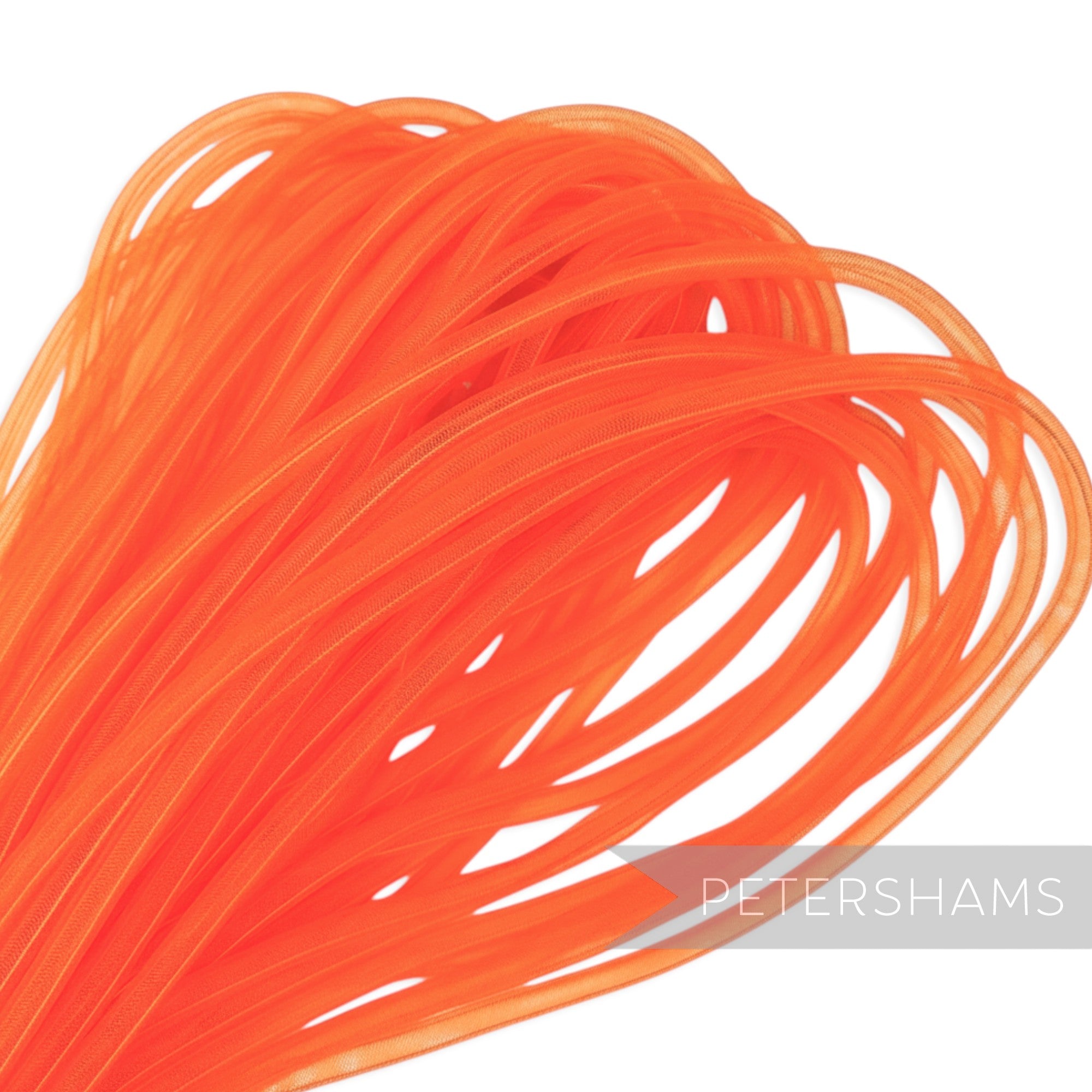 Petershams bright orange 8mm tube millinery crinoline trim, slightly sheer and threaded for gathering.