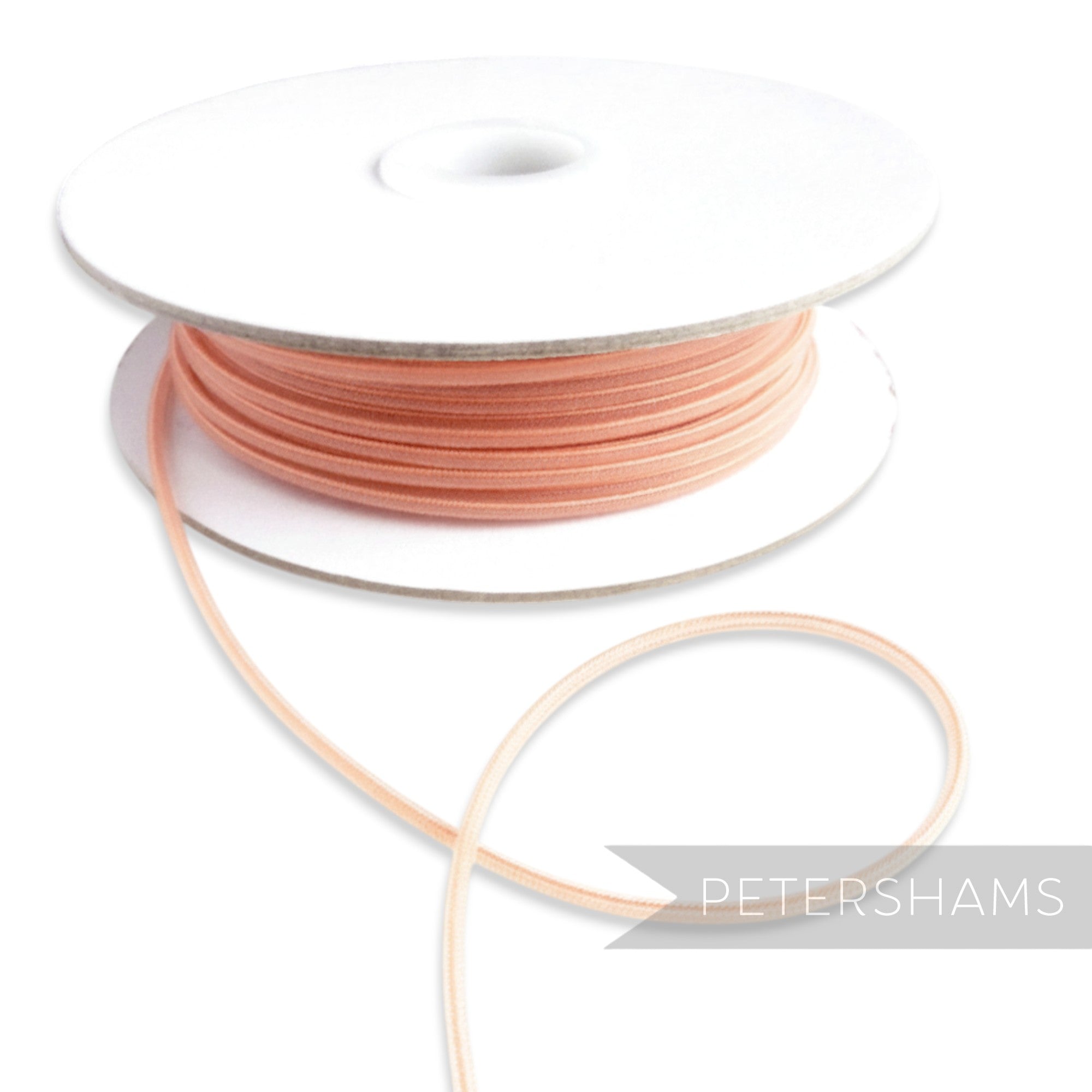 Petershams Millinery Supplies peach 2.5mm tubular crinoline trim with a central thread for gathering.