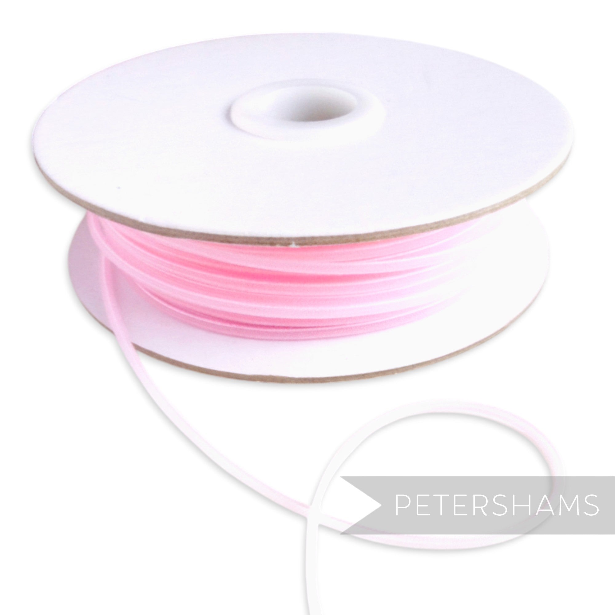 Petershams Millinery Supplies pale pink 2.5mm tubular crinoline ribbon on a spool, perfect for headbands.