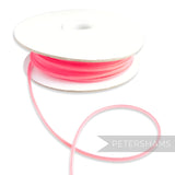 Petershams bright pink 2.5mm tubular millinery crinoline tubing with a central thread for gathering.